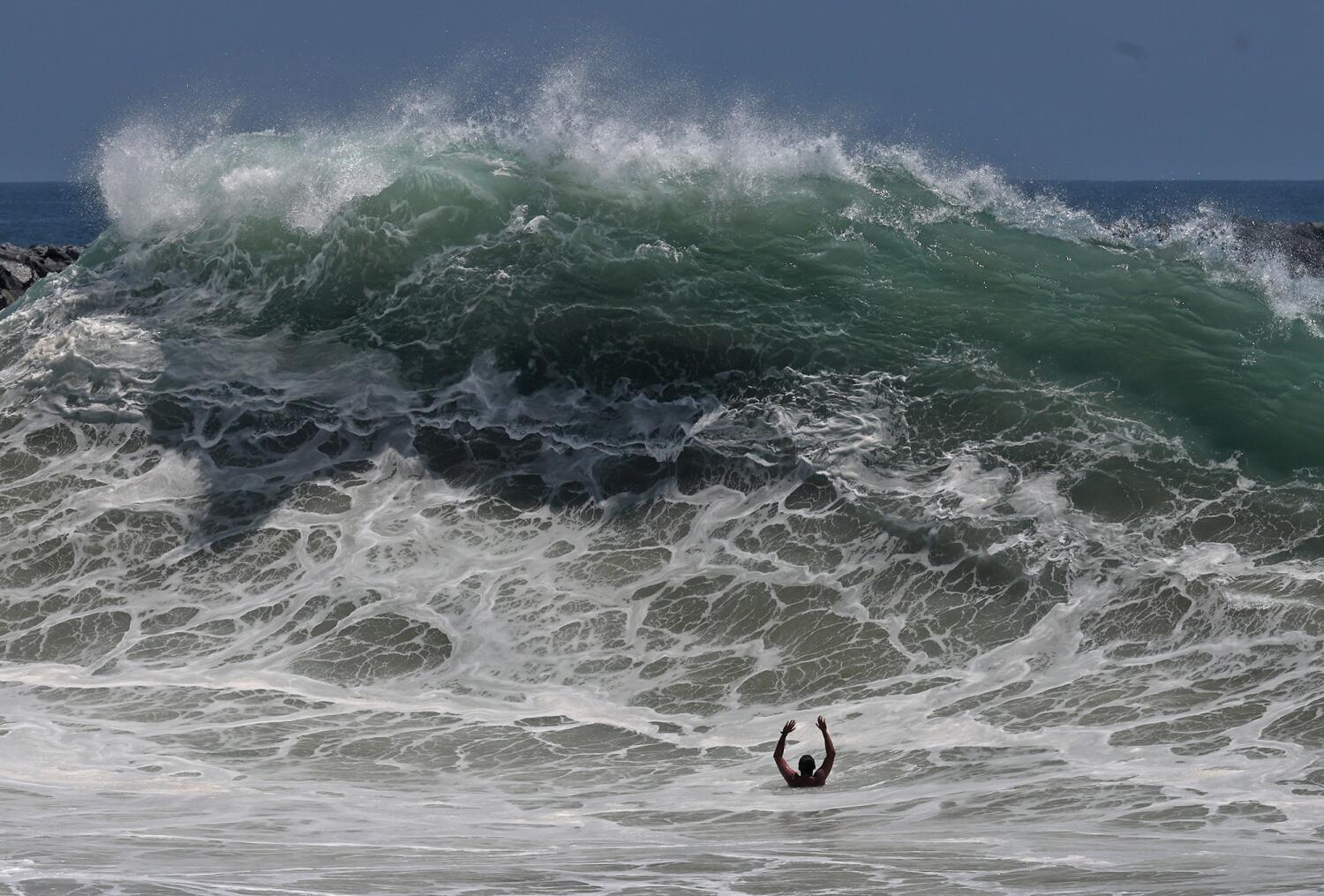 Historic swells continue to batter California beaches. When will the surf die down?